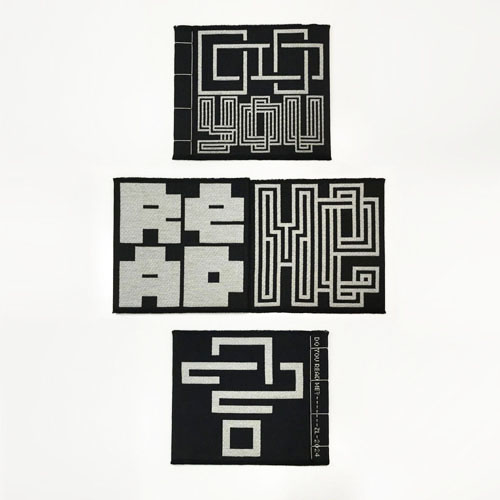 This series of book objects plays with type as abstraction.